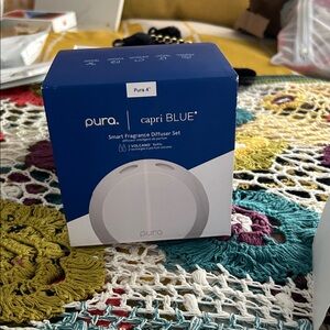 Pura Smart Fragrance Diffuser Set in Blue Includes 2 refills $24 each